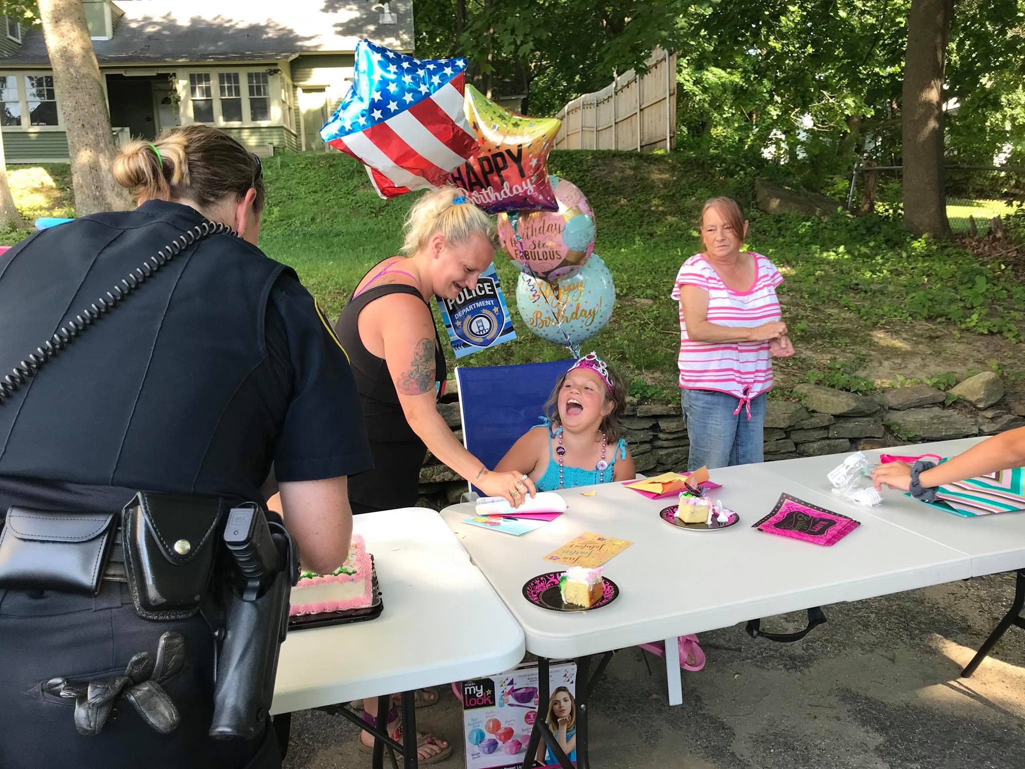 Police Officers Throw Surprise Party For 8 Year Old Girl After No
