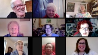 In this May 11, 2020, image made from video provided by Greenwich House, people laugh as they gather online for a comedy class through Greenwich House in New York. Professional comedian Jo Firestone leads the group through monologue bits and rapid-fire prompts as they try to find humor during the coronavirus pandemic.