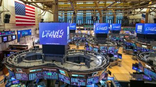 This file photo provided by the New York Stock Exchange shows the unoccupied NYSE trading floor, closed temporarily for the first time in 228 years as a result of coronavirus concerns, Tuesday March 24, 2020.