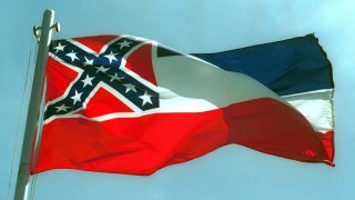 The Mississippi State flags flies April 17, 2001 in Pascagoula, MS.