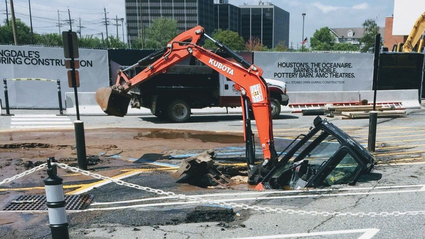 Sinkhole In New Jersey Swallows Construction Equipment Nbc New York