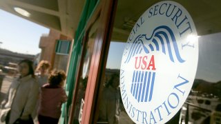 FILE – People line up outside of the Social Security Administration office, Feb. 2, 2005, in San Francisco.