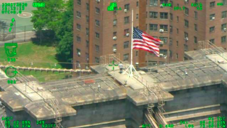 aerial image of man on top of bridge