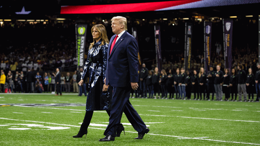 President Donald Trump and first lady Melania Trump arrive for the College Football Playoff National Championship game between LSU and Clemson, Monday, Jan. 13, 2020, in New Orleans.