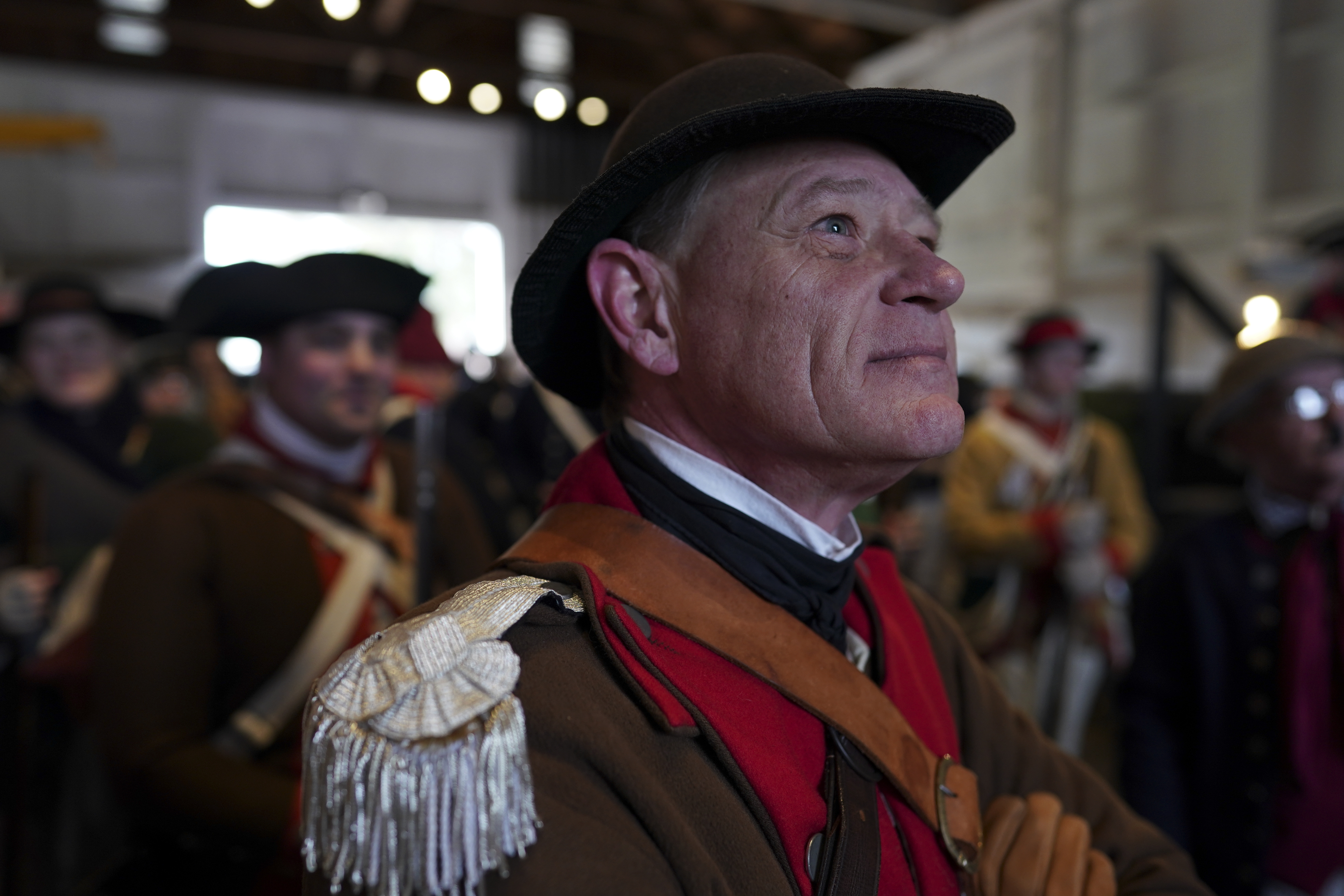 Revolutionary war re-enactors participate in the 66th annual re-enactment of Gen. George Washington crossing the Delaware River, Dec. 25, 2018, in Upper Makefield, Pa. High water levels prevented the re-enactors from rowing their Durham boats across the river.