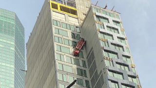 Window washing scaffold danging in Midtown