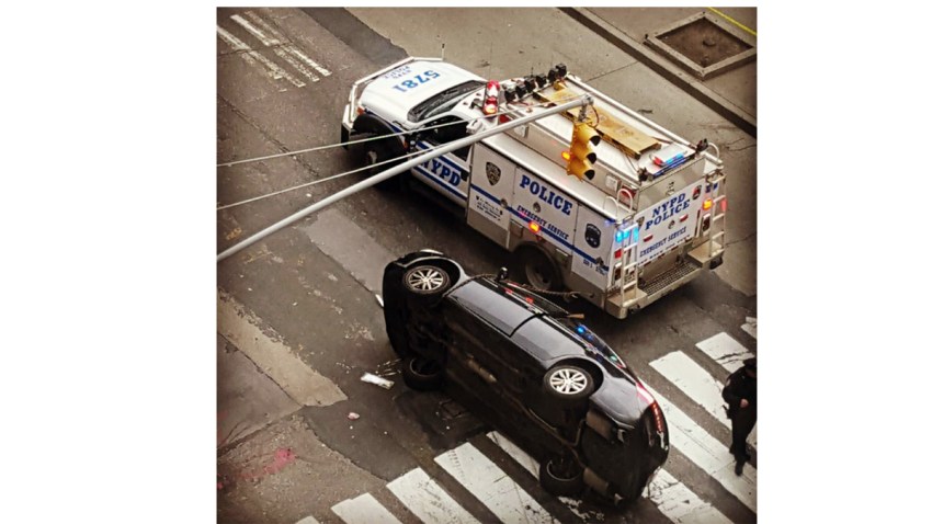 car overturned in manhattan