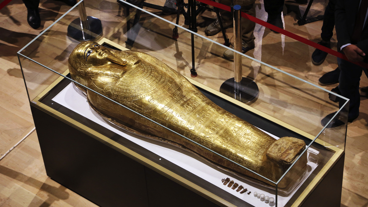 mummy with coffin really gold