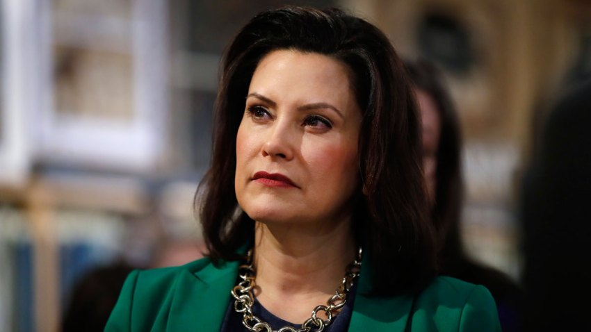 In this March 18, 2019, file photo, Michigan Gov. Gretchen Whitmer listens to Democratic presidential candidate Sen. Kirsten Gillibrand, D-N.Y., in Clawson, Mich. Whitmer is moving to make Michigan the first state to ban flavored e-cigarettes.
