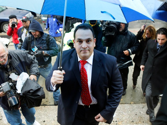 State Senator Hiram Monserrate enters the Queens courthouse in N