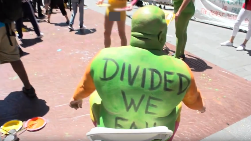 Protesters Take a Naked Stand Against Divisiveness in 