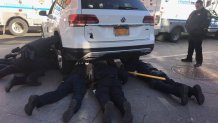 officers under car