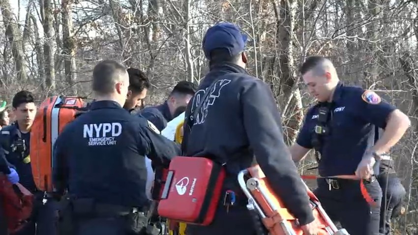 Rescue crews at Queens pond