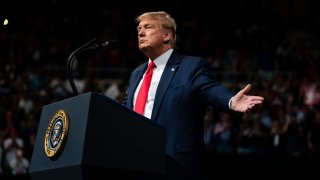 In this Feb. 19, 2020, file photo, President Donald Trump speaks during a campaign rally at Veterans Memorial Coliseum in Phoenix, Ariz.