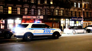 Police were outside a building on Amsterdam Avenue in the Upper West Side after a woman stabbed her husband to death
