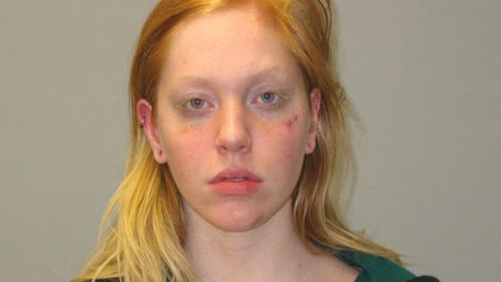 woman hits cows