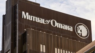 The Mutual of Omaha logo is seen at the company's corporate headquarters in Omaha, Neb., Friday, July 17, 2020. Insurance company Mutual of Omaha has announced it will replace its longtime corporate logo, which features a depiction of a Native American chief.