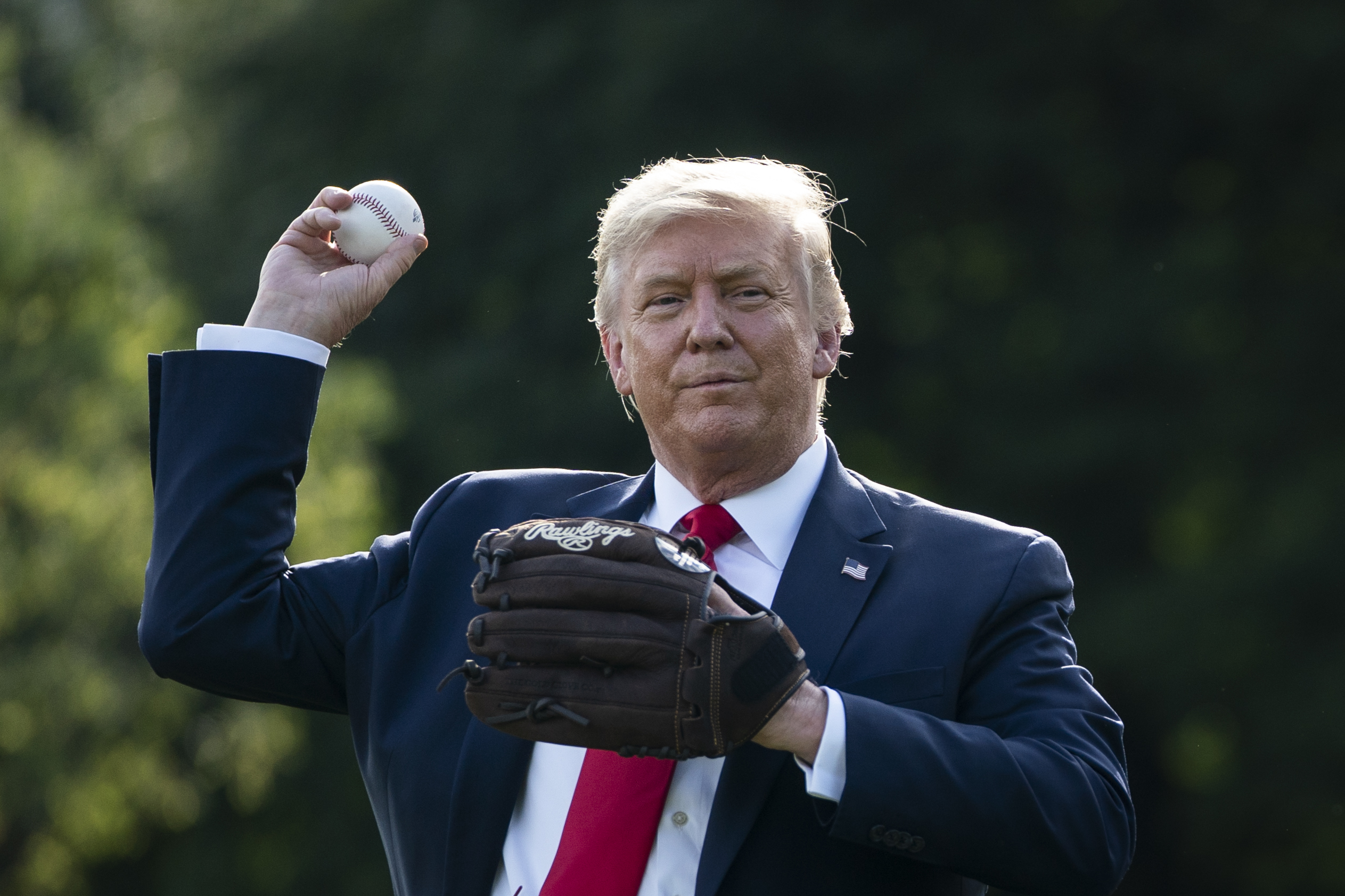 U.S. President Donald Trump with Mariano Rivera, the MLB Hall of Fame  Closer from the Yankees, watch young players to mark the Opening Day of the Major  League Baseball Season on the