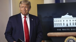 U.S. President Donald Trump arrives to a news conference in the James S. Brady Press Briefing Room at the White House in Washington, D.C., U.S. on Tuesday, July 28, 2020. Trump will allow certain young, undocumented immigrants to renew deportation protections for one year as his administration reviews a Supreme Court decision that blocked his efforts to end a program designed to let them to remain in the U.S.