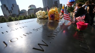 Flowers replaced over the monument for the 9/11 attacks victims