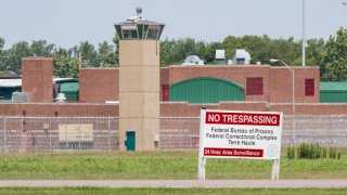 This July 15, 2020, file photo shows the entrance to the federal prison in Terre Haute, Indiana.