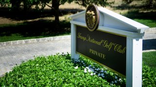 In this Aug. 9, 2018, file photo, a sign is seen at an entrance to the Trump National Golf Club in Bedminster, New Jersey.