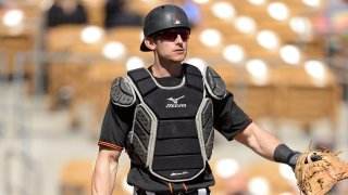 Rob Brantley #76 of the San Francisco Giants catches against the Chicago White Sox on February 25, 2020.