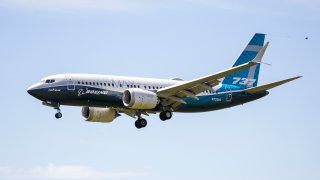 A Boeing 737 MAX jet comes in for a landing following a Federal Aviation Administration (FAA) test flight at Boeing Field in Seattle, Washington on June 29, 2020. - US regulators conducted the first a test flight of the Boeing 737 MAX on Monday, a key step in recertifying the jet that has been grounded for more than a year following two fatal crashes. A MAX aircraft took off from Boeing Field in Seattle at 1655 GMT, a Federal Aviation Administration spokesperson said. (