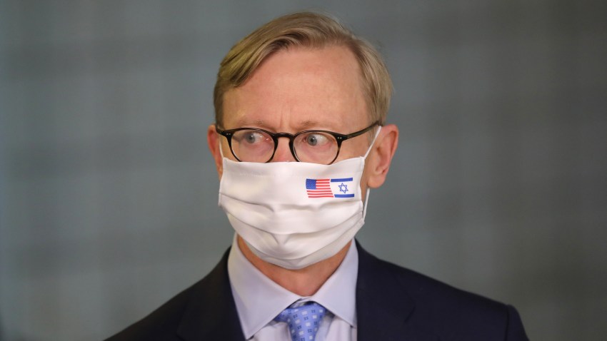 US special representative for Iran Brian Hook wears a face mask against Covid-19, bearing the US and Israeli flags, during a meeting with the Israeli prime minister in Jerusalem on June 30, 2020.