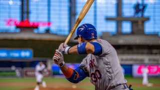 MIAMI, FLORIDA – AUGUST 19: Michael Conforto #30 of the New York Mets watches a pitch as he warms up from the on deck circle in the first inning against the Miami Marlins at Marlins Park on August 19, 2020 in Miami, Florida. (Photo by Mark Brown/Getty Images)