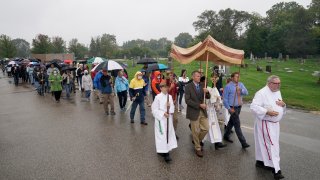 Churchgoers participate in a procession