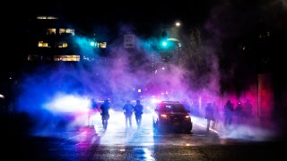 Portland police disperse a crowd on September 23, 2020 in Portland, United States