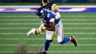 Terrell Edmunds #34 of the Pittsburgh Steelers tackles Levine Toilolo #85 of the New York Giants during the second half at MetLife Stadium on September 14, 2020 in East Rutherford, New Jersey.