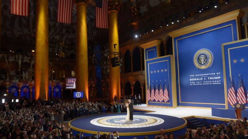 US President Donald Trump and First Lady Melania Trump dance during the Salute to Our Armed Services Inaugural Ball at the National Building Museum in Washington, DC, January 20, 2017.