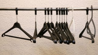 Empty hangers on row. France.