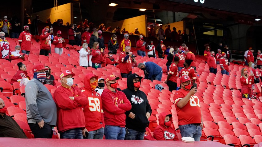In this Thursday, Sept. 10, 2020 file photo, fans stand for a presentation on social justice before an NFL football game between the Kansas City Chiefs and the Houston Texans in Kansas City, Mo.
