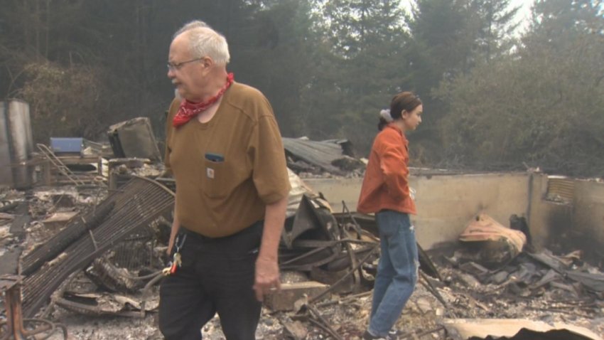 Total Destruction: Family Surveys Ashes of Home Lost to Wildfire