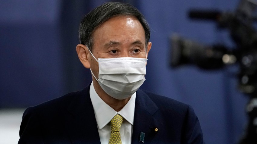 Japanese Chief Cabinet Secretary Yoshihide Suga casts his ballot for the Liberal Democratic Party's (LDP) leadership election on September 14, 2020, in Tokyo, Japan.