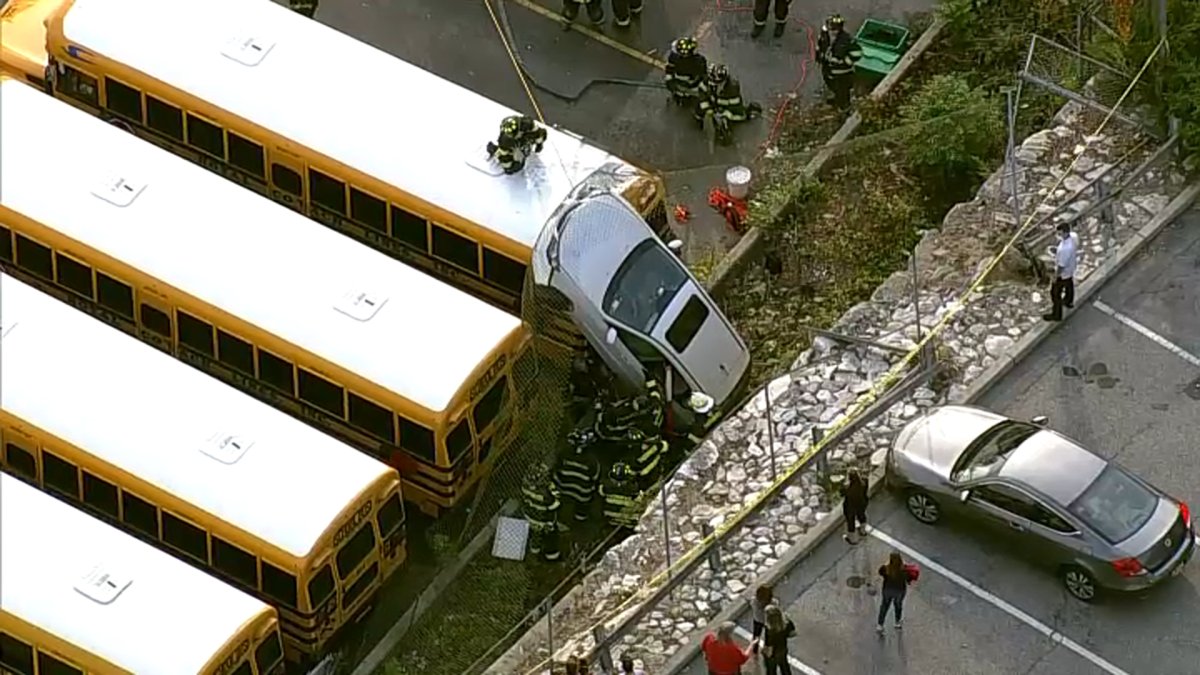 Car Plunges Off Parking Embankment Into School Bus Lot in Westchester ...