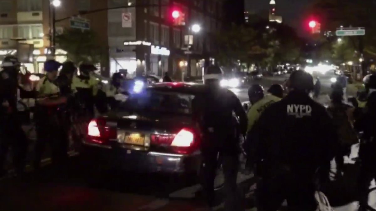 Woman Accused of Bumping 2 NYPD Cops With Car Amid Police Shooting ...