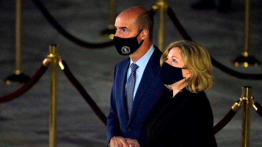 Labor Secretary Eugene Scalia and his wife Patricia pay respects to Justice Ruth Bader Ginsburg as she lies in repose in front of the US Supreme Court in Washington, DC on September 23, 2020. - Ginsburg, whose death has opened a crucial Supreme Court seat that Republican President Donald Trump has promised to quickly and controversially fill against the wishes of Democrats, will lie in repose beginning September 23, 2020 at the US high court. Trump will announce his pick to replace Ginsburg Saturday, with Senate Republicans promising a swift vote on the nominee.