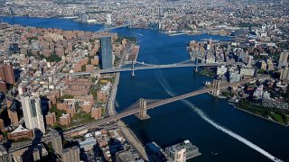 NEW YORK, NEW YORK – SEPTEMBER 22: Aerial view of New York City with the East River crossed  by Brooklyn Bridge, Manhattan Bridge and Williamsburg Bridge captured from above on September 22, 2020 in New York City. (Photo by Dominik Bindl/Getty Images)