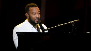 In this Oct. 14, 2020, file photo, John Legend performs onstage at the 2020 Billboard Music Awards, broadcast at the Dolby Theatre in Los Angeles, California.