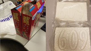 Two packages of cocaine and the boxes of Lucky Charms cereal they were found hidden in