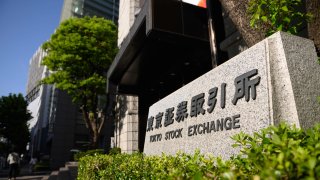 Signage for the Tokyo Stock Exchange (TSE), operated by Japan Exchange Group Inc. (JPX), is displayed outside the bourse in Tokyo, Japan, on Friday, Oct. 2, 2020.