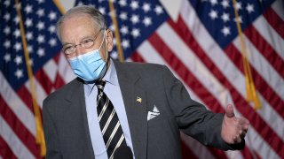 Senator Chuck Grassley, a Republican from Iowa, speaks to members of the media while walking to Senate Republican policy luncheons at Hart Senate Office Building in Washington, D.C., U.S., on Monday, Oct. 26, 2020.