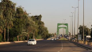 Iraqis drive in Baghdad's high-security Green Zone after all the main roads criss-crossing the enclave were opened on June 3, 2019. - The Green Zone, home to the Iraqi parliament and US embassy, fully reopened to traffic around the clock today, the government said. It has been heavily fortified since the US-led invasion that overthrew dictator Saddam Hussein in 2003, with nearly all Iraqis denied access to its 10 square kilometres.