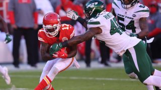 Mecole Hardman #17 of the Kansas City Chiefs runs with the ball against the New York Jets