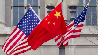 lags of the U.S. and China fly along Pennsylvania Avenue in Washington, D.C.