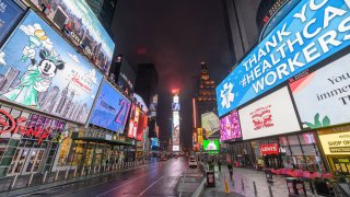 Lights shines still in Times Square as people remain at home to stop the spread of coronavirus on March 29, 2020 in New York City.